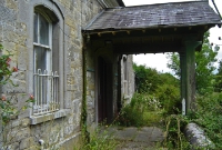 The station building at Crossdoney, dating from 1856, is unsually located at a higher elevation to the railway, and steps therefore lead down to platform level.