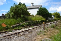 The station at Curry village only ever had one platform, with a siding serving the goods shed at the north end of the station. The station opened with the line in 1895 and closed to passenger and goods in July 1963, though the line remained in use until 1975.