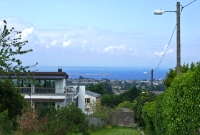 A view from the top of the tramway summit just before it begins its steep descent down towards Dun Laoghaire. Dublin Bay provides a nice backdrop this location.