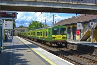 8500 Class DART unit No.8601 arrives at Dalkey on a sunny afternoon with a southbound stopping service to Greystones. This is a mixed DART set containing two of the different 8500 Class units.
