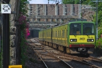 The rock cuttings through which the railway line runs through in the Dalkey area are very colourful, 8500 DART No.8632 approaches the station with a southbound service to Bray. Note the rising gradient on the approach to the station and the tight curve in the distance, legacy of the former horse tram road.