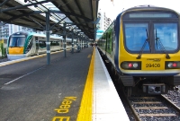 Two comparatively new generations of diesel railcars are seen together at the Docklands Station, which as seen here has two platforms.
