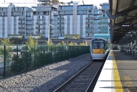 The area behind the new Docklands Station was once the former London &#38; North Western Railway&#39;s goods yard, latterly converted to a container terminal in the early 1970s. The LNWR freight yard and the adjacent Midland Great Western yard closed to freight trains in 2005, and sites are now built over with new apartments seen here.