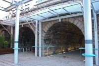 The arches, which carries the adjacent Sheriff Steet over the former freight yard at the Docklands Station. Until 2005 freight trains were passing through these arches on container trains.