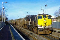 A loaded cement train from Platin utilising the 1977 built bogey bulk wagons is been lead by No.085, heading for Dublin&#39;s North Wall yard. The cement train would then travel to one of the last cement terminals open at this time at Tullamore, Co.Offaly.