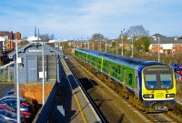 29000 Class railcar No.29425 looks well in the afternoon sun as it arrives into Donabate Station with a service from Drogheda to Dublin Pearse. The signal cabin at Donabate has been disused since the station ceased to be a signalling block post in 1983.