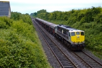 Characteristly missing its Irish Rail logo, 071 Class loco No.075 ambles along the main line north of Donabate Station with its empty ore train from Alexandra Rd to Tara Mines. No.075 entered service with CIE way back in June 1977.