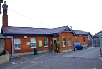 The single storey brick built GNR booking office at Donbate, viewed from the approach road. The wooden gable boards are a typical GNR design seen on other stations along the line.