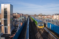 One of the modern lift shafts for the new footbridge at Donabate Station stands prominently on the down platform as 29000 Class railcar No.29108 rolls into the station with a southbound service from Drogheda.