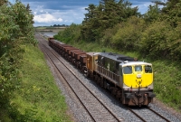 With the Rogerstown Estuary visible in the background, No.079 is seen again at Beaverstown as it returns to Dublin having deposited part of its ballast near Skerries.