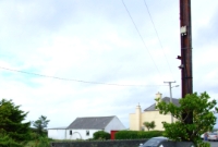 The site of the level crossing at the north end of Doonbeg Station, looking towards Ennis.