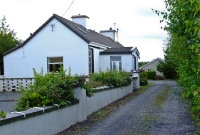 Doonbeg Station, looking towards Kilkee &#38; Kilrush. The single storey building is typical of type built at single platform stations on the West Clare line.