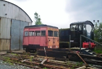 Outside one of the sheds at Downpatrick is a CIE Wickham inspection car, now restored as &#39;Rosie&#39;, and the other E Class loco No.E421, which is painted in CIE&#39;s one time black livery.