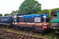 One of the Downpatrick Railways ex CIE E Class locomotives, No.E432, seen in its black &#38; tan livery stored in a siding adjacent to the station.