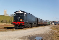 A39 complete with the ITG headboard, excellerates away from Downpatrick with a special for the &#39;Loop Platform&#39;, located to the south of the town.