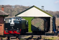 CIE G Class locomotive No.G617 stands with other the diesel residents at Downpatrick Station. The building seen here is the former goods shed of Maghera Station on the former 1880s built Derry Central line which closed completely in 1950, it is now used as the locomotive shed.