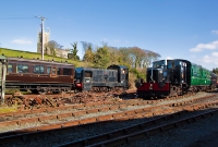 Ex CIE E Class locomotive No.E421 makes up a train at Downpatrick Station formed of the ex Great Southern &#38; Western&#39;s carriage No.836, while G Class loco No.G617 prepares to form a service to Inch Abbey.