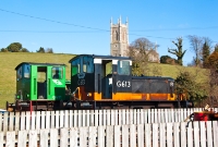 The Downpatrick Railway currently has three ex CIE G Class locomotives. Originally built by Deutz of Germany, they were deliveried to CIE as a second batch in 1961. Here G611 and G613 are stabled outside the loco shed, with the &#39;Down Catherdral&#39; on the hill above.