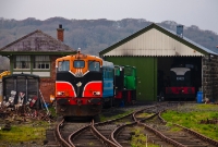 No.146 shares the surroundings at Downpatrick engine shed with ex CIE G and E Class locomotives, all of which originated in the 1960s. To the left of 146 can be seen various signalling material awaiting installation at Downpatrick.
