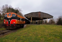 This is the &#39;Loop Platform&#39; on the former Belfast to Newcastle line, which still retains its vintage Belfast &#38; Co.Down Railway canopy. No.146 stands on the line heading back into Downpatrick, while on the right is the platform used for trains avoiding Downpatrick heading for either Belfast or Newcastle.