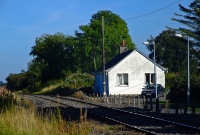 The site of the one time loop at Downs Bog located at mile post 46 measured from Dublin Broadstone. The loop and sidings were removed in 1977 when it ceased to be block post. The building seen here is the former signalmans cottage.