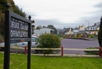 An original CIE name board, erected recently at the southern end of Drimoleage Station, where now a small park and playground is sited at this once busy junction.