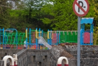 The Cork Bandon &#38; South Coast Railway style level crossing gate posts remain in situ at the south end of Drimoleague Station. The playground in the backgrond is sited on the trackbed of the former line to Bantry.