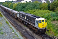 Sister loco No.075, in its silver &#38; black livery with its missing Irish Rail logo, approaches Drogheda with the empty rake of Tara Mines wagons from Dublin Port. The train would soon diverge onto the Navan branch for Tara Mines.