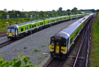 One of the older generation of railcars, 2800 Class No.2612, passes a 29000 unit stabled at the south end of depot at Drogheda. No.2612 is arriving with a service from Dublin.