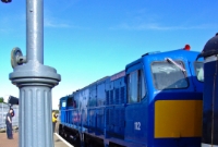 A view of blue liveried 112, named &#39;Northern Counties&#39;, at the down platform at Drogheda Station. The water column on the left can still be used by RPSI steam locomotives.