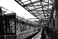 The 1960s Craven built carriages of Sheffield are now used by the RPSI, as seen here at Drogheda. The canopy on the down platform dates from the station&#39;s opening in 1853.
