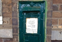 A Victorian era letter box mounted onto the station building at Drogheda.