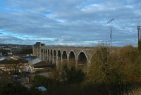 The Boyne viaduct at Drogheda was finally completed in 1854, and carried double track. When the central metal spans were rebuilt in 1932, it was singled with interlaced track, today it is just single track only.