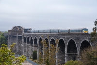 A morning &#39;Enterprise&#39; service to Belfast crosses the Boyne Viaduct north of Drogheda Station, headed by 201 Class loco No.230.