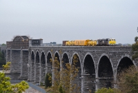 Loco No.073 is en route from Dundalk to Navan and is approaching Drogheda with Irish Rail&#39;s annual weed spraying train. The stone arches of the Boyne Viaduct are original and date from 1855.