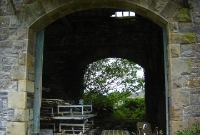 A view looking into the derelict Dromahair good shed. On the opposite side of the structure was a single siding, the site of which is heavily overgrown.