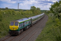 A view looking south from the road overbridge at Dromin, where 201 Class loco No.227 in green &#38; silver &#39;Intercity&#39; livery is seen propelling this southbound &#39;Enterprise&#39; from Belfast to Dublin.