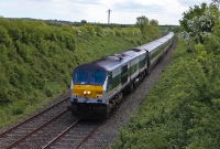 Seen at the same location is NIR&#39;s matching &#39;Enterprise&#39; liveried 201 Class loco No.8208, operating the late running 13:20 from Dublin Connolly to Belfast Central.
