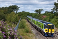 An 8-car 2800 Class railcar set heads a Dublin to Drogheda service past the former Domin Jct, with No.2818 forming the rear unit.