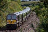 Loco No.230 &#39;River Bandon&#39; is glimpsed at the south end of Dromin as it propels its &#39;Enterprse&#39; service to Dublin.