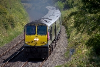 201 Class loco No.233 approaches milepost 43½ on the Dublin to Belfast main line with a northbound &#39;Enterprise&#39; service, just south of the former Dromin Junction.