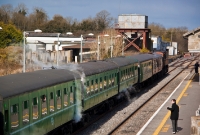 Steam rises from the ex CIE 1950s built coaching stock at Dromod Station. As the former goods shed on the right is a listed building, the extended up platform had be carefully cut through a section of the structure.