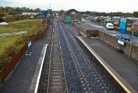 A view looking west towards Sligo from the footbridge at Dromod Station, taken before modernisation. Nowadays the platforms have been extended considerably and the MGWR signal cabin has been demolished.