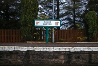 One of Irish Rail&#39;s 1980s T board signs on the down platform at Dromod Station, complete with IR &#39;Point&#39; logos. The platforms at Dromod have since been resurfaced with tarmac and concrete capping.