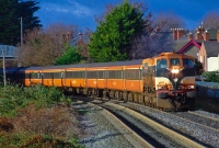 Rounding the curve on the approach to Druncondra Station in the morning sun is 071 Class loco No.076, leading a Sligo to Dublin service on its last leg of its journey into the city. This service is now operated by 22000 Class railcars.
