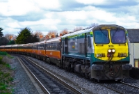 201 Class loco No.229 is seen heading a rake of 1980s British Rail &#39;International&#39; Mk3 stock into Drumcondra. These Mk3 carriages were originally employed on the Dublin to Galway service and have since been withdrawn from service.
