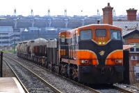 No.147 is now seen again at Drumcondra Station has it heads a freight wagon transfer from Dublin to the wagon workshops in Co.Limerick. On the train are a Tara Mines, ballast and bulk cement wagons, the latter have all since been scrapped.