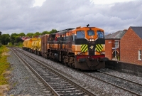 A final view of the weed spraying train in the Drumcondra area; No.078 in its orange &#38; black livery approaches the station as it returns to the North Wall yard having sprayed the Sligo line.