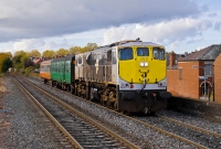 Seen at the same location but this time in October, sister loco No.083 has just two carriages in tow as it approaches Drumcondra Station from Mullingar. The two ex CIE carriages, one a Craven bar  No.1514, are owned by the Railway Preservation Society of Ireland.