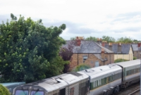 201 Class loco No.209 propels the DD test train past Claude Rd as it nears Drumcondra Station. Behind the loco is the Mk3 generator van, repainted into the &#39;Enterprise&#39; livery and renumbered No 89605.